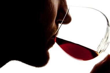 Silhouette of man tasting alcohol clipart