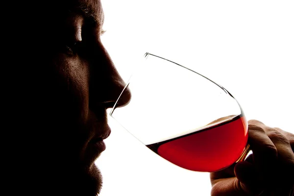 Silueta člověka degusting víno — Stock fotografie
