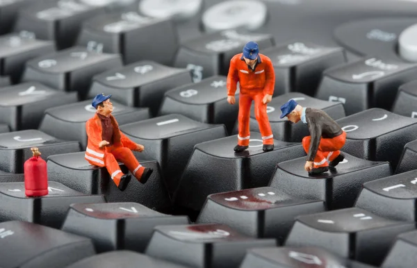 Werknemers toetsenbord repareren — Stockfoto