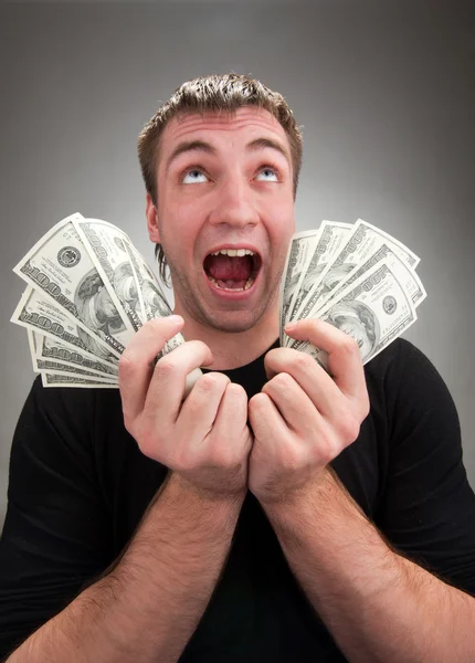 Very excited man with money — Stock Photo, Image