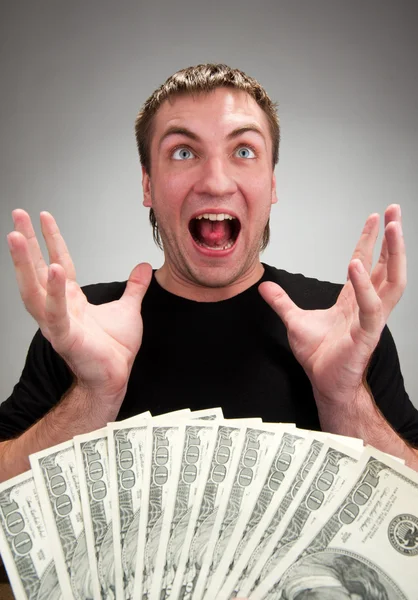 Uomo molto eccitato con i soldi — Foto Stock