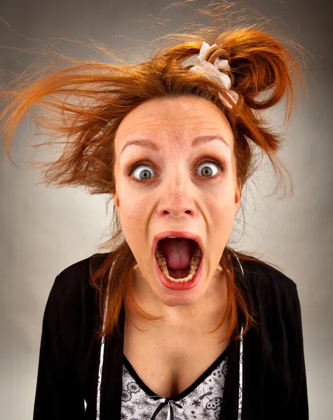 Very surprised screaming housewife — Stock Photo, Image