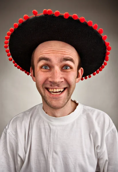 Laughing man in een sombrero hoed — Stockfoto