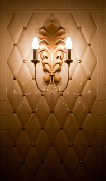 Lamp on vintage tile wall — Stock Photo, Image