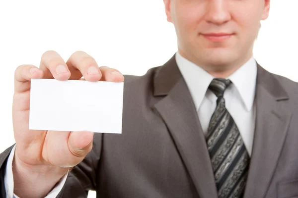 Empresario mostrando tarjeta en blanco — Foto de Stock