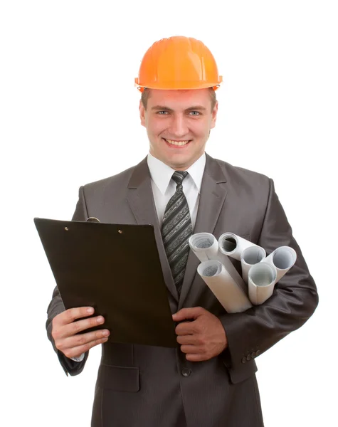 Engineer with plans and clipboard — Stockfoto