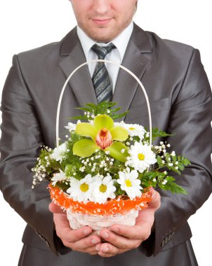 Happy businessman with basket of flowers clipart