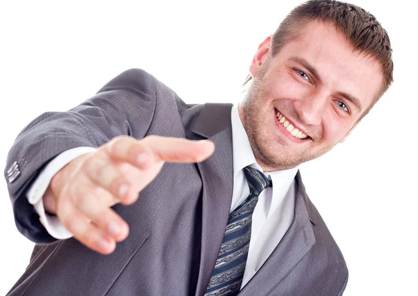 Lächelnder Geschäftsmann gibt Handschlag — Stockfoto