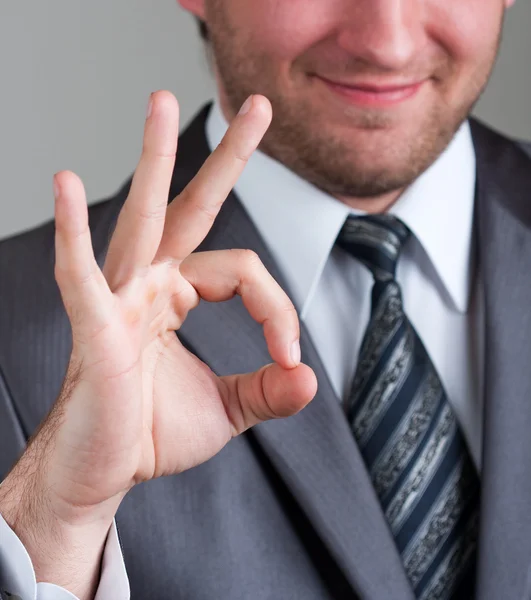 Businessman showing OK sign — Stock Photo, Image