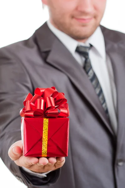 Red gift in hand — Stock Photo, Image