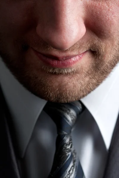 Grave uomo d'affari sorridente — Foto Stock