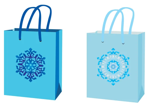 Blauwe pakketten met een sneeuwvlok — Stockvector