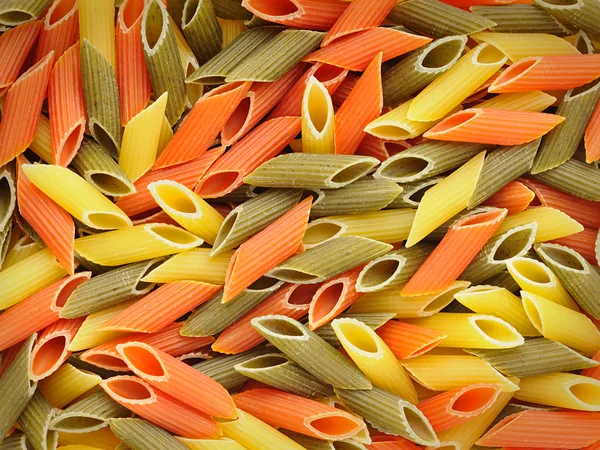 stock image Multicolored pasta, horizontal background