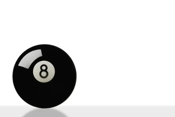 stock image Eight ball on white with slight reflection