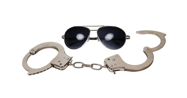 Handcuffs and Aviator Glasses — Stock Photo, Image