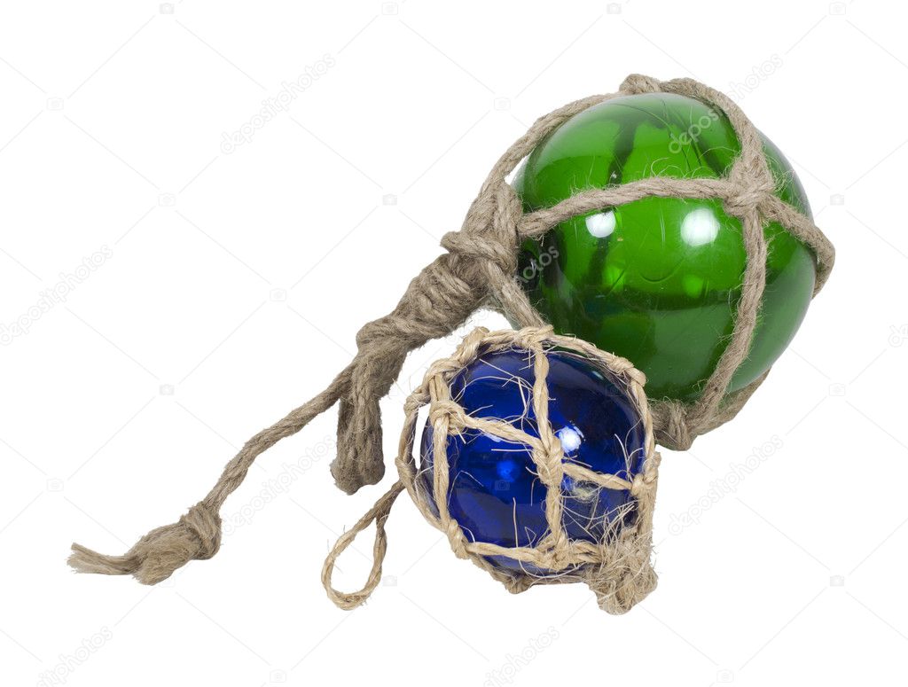Green and blue nautical glass floats tied with rough rope - path included