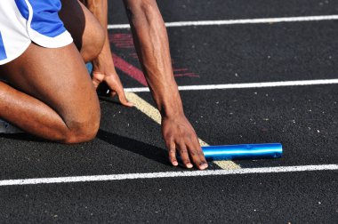 Teen Boy in the Starting Blocks clipart