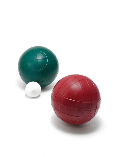 Red and Green Bocce Balls and Pallino (Jack or Boccino) ) — стоковое фото