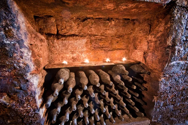 Stock image Wine bottles with candles