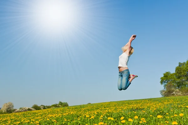 Happy young woman on meadow — Stock Photo, Image