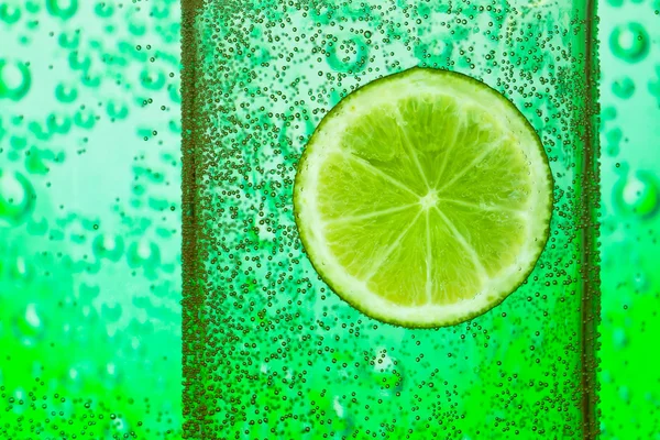Lime with bubbles — Stock Photo, Image