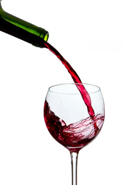 stock image Pouring red wine