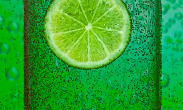 Lime with bubbles — Stock Photo, Image