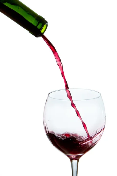 stock image Pouring red wine