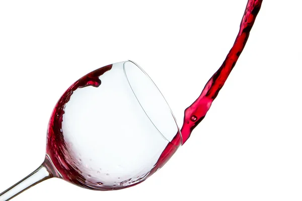 stock image Pouring red wine