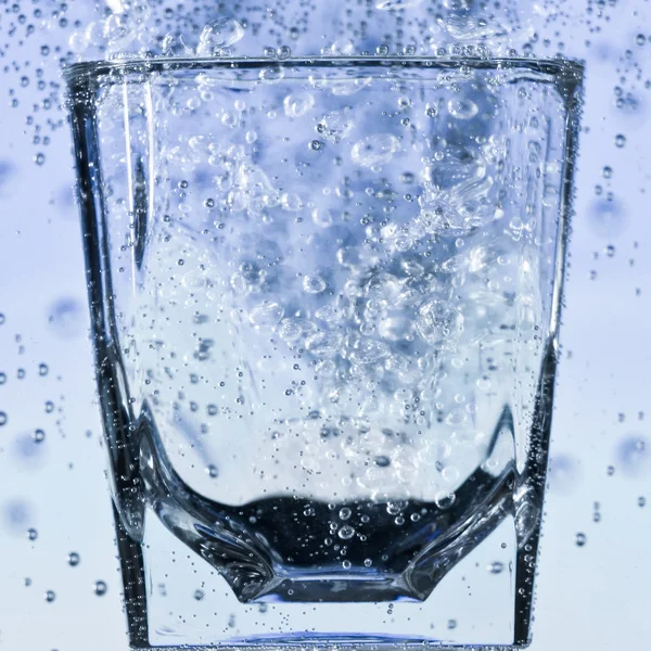 stock image Glass with bubbles