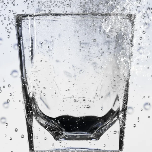 stock image Glass with bubbles