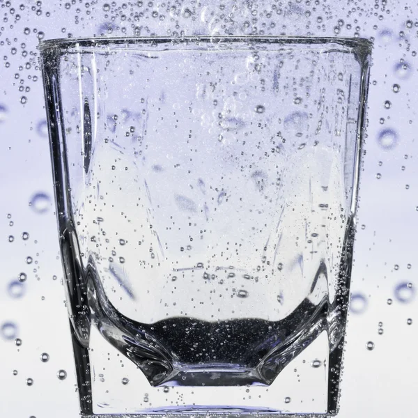 stock image Glass with bubbles