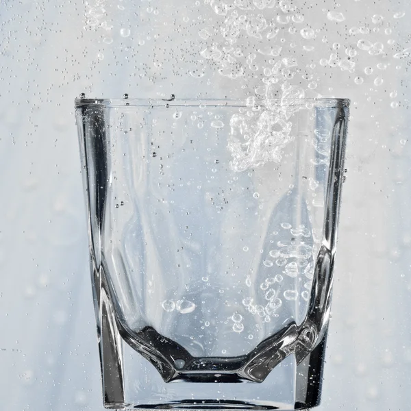 stock image Glass with bubbles