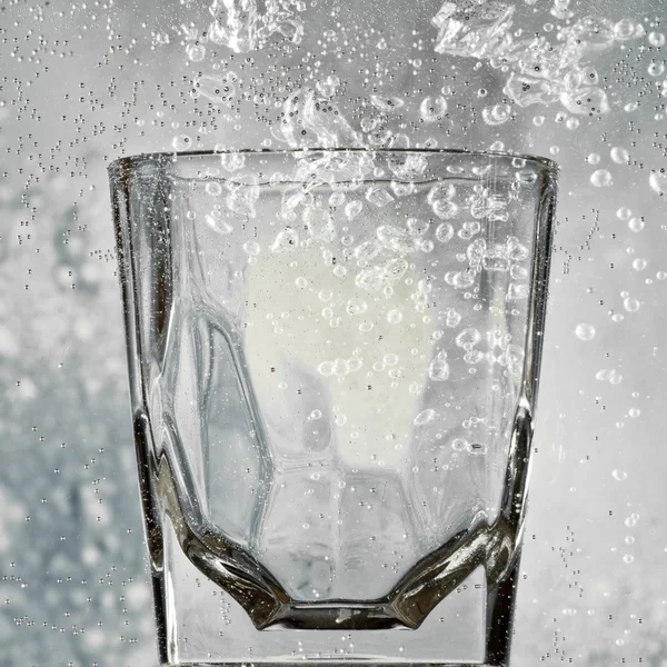 stock image Glass with bubbles