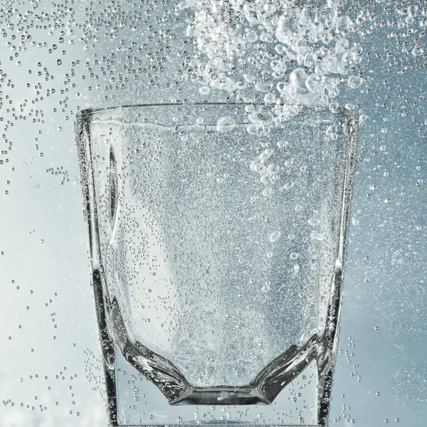 Stock image Glass with bubbles