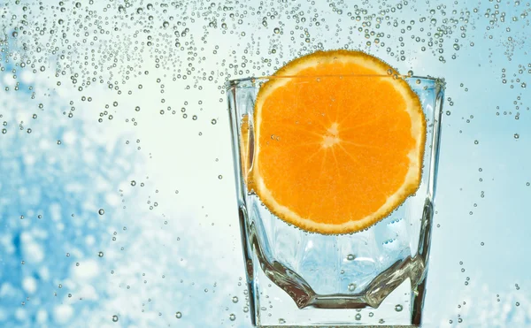 stock image Glass with orange