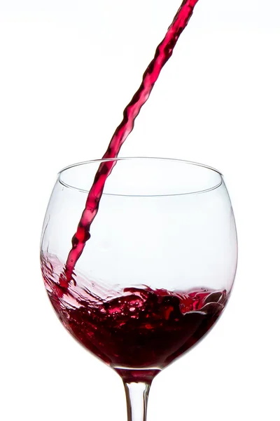Наливание красного вина — стоковое фото