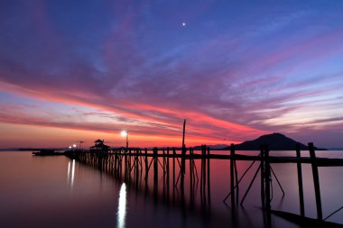 Sunset at Kanawa Island, Indonesia clipart