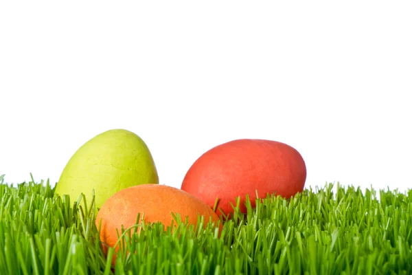 stock image Easter eggs in grass