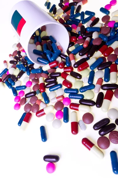 Pillole fuoriuscite dal contenitore — Foto Stock