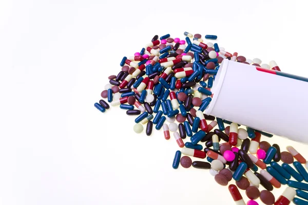 stock image Pills spilling out of container