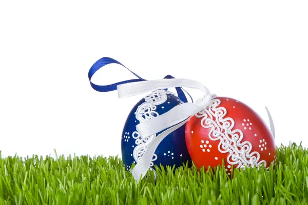 stock image Easter eggs in grass