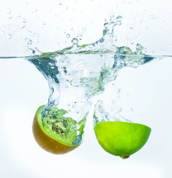 Citrus fruit splashing Stock Picture