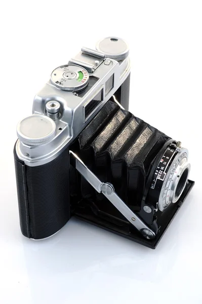 stock image Vintage camera over a white background