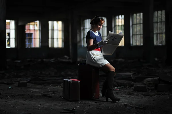 stock image Retro beauty in an indoor location, with newspaper