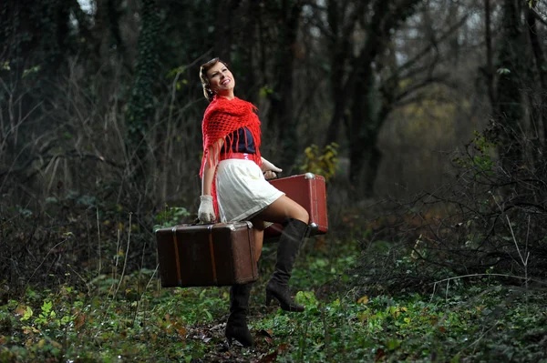 stock image Retro woman with suitcases