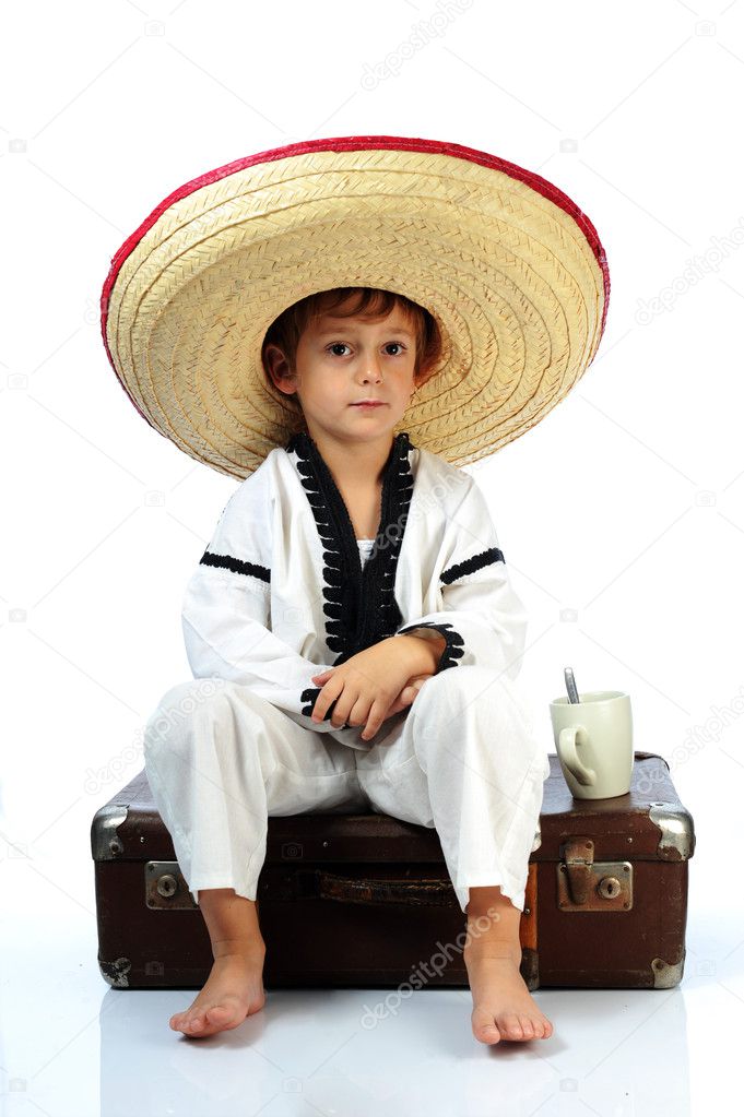 Toddler wearing a large sombrero hat