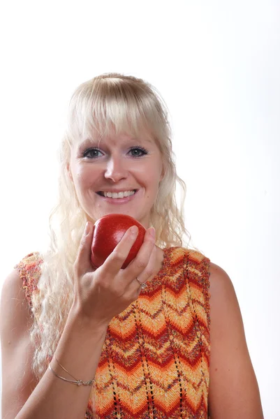 Blondine Kvinde Spiser Æble - Stock-foto