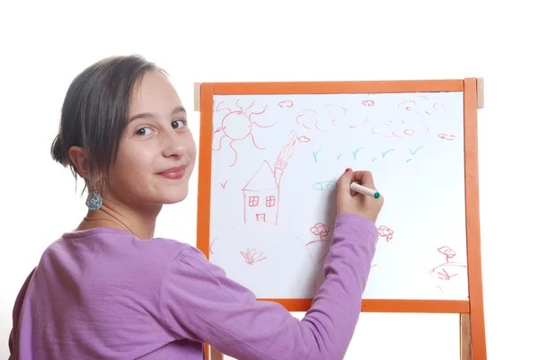 Young girl drawing on the white board — Stock Photo, Image