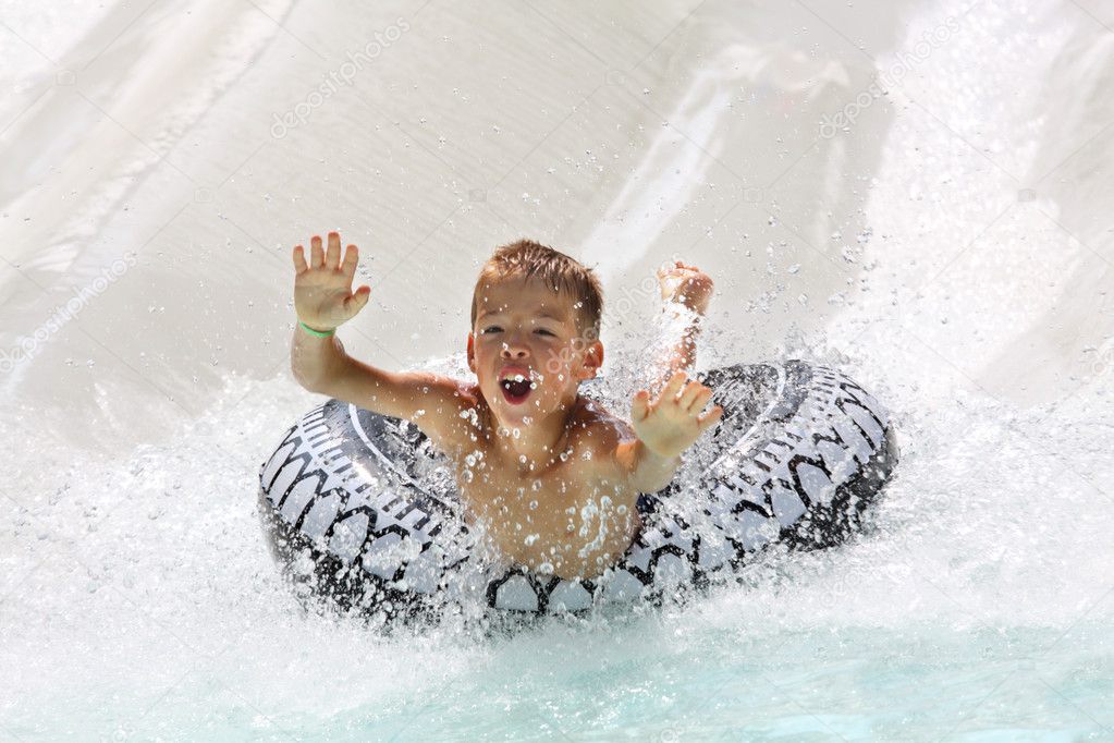 Boy having fun in water park
